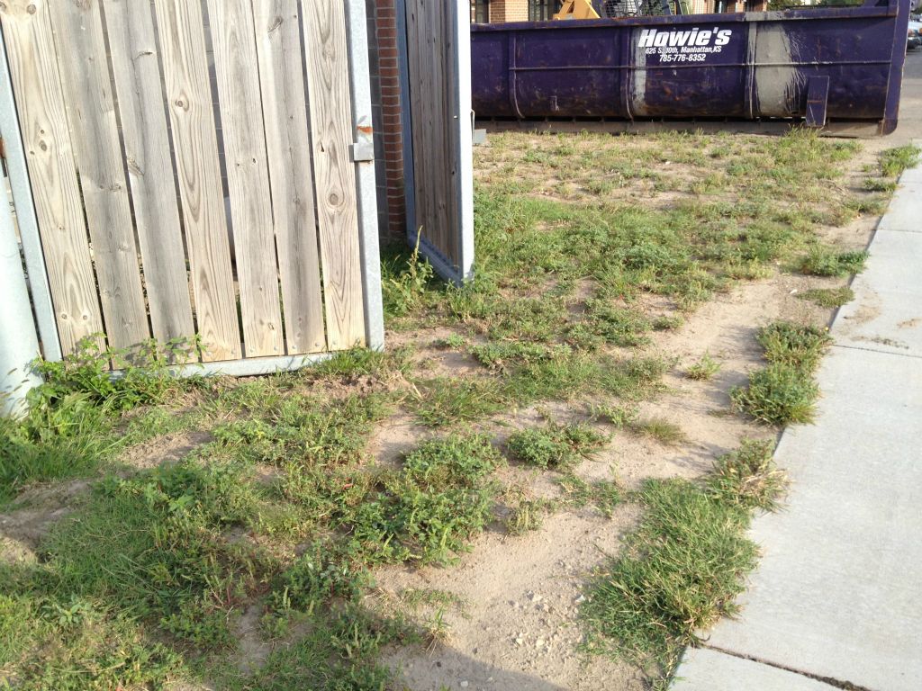 TRASH ENCLOSURE TO BE MODIFIED